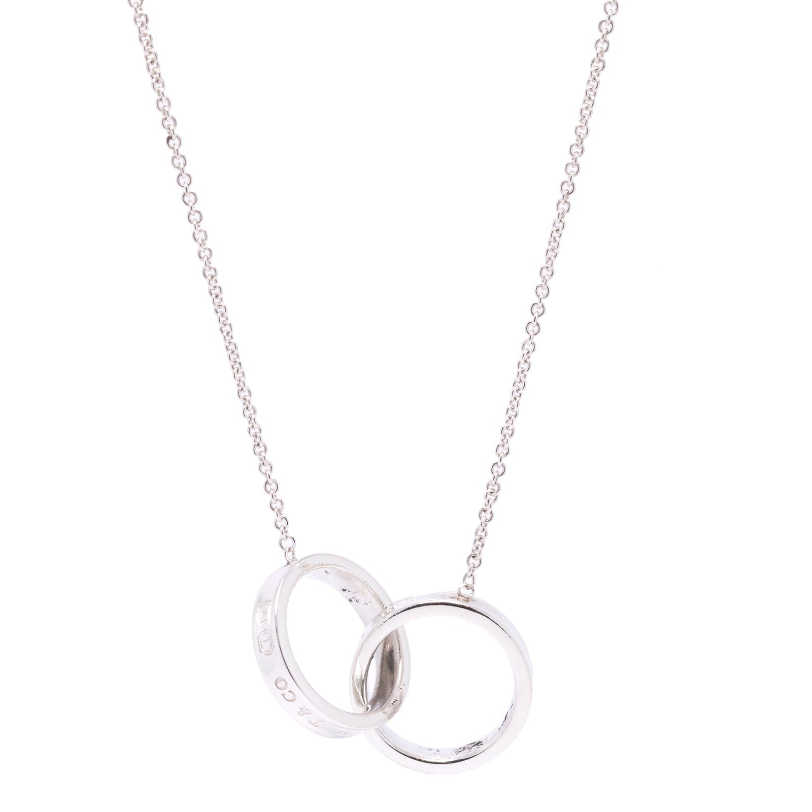 Tiffany & Co. - Sterling Silver Mini Interlocking Rings Necklace – Current  Boutique